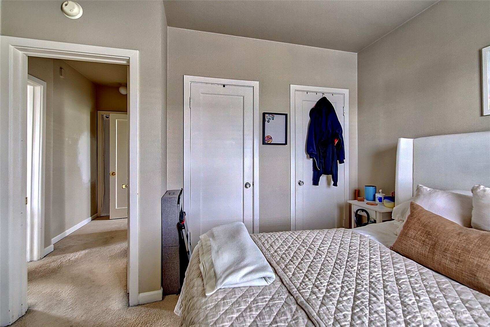 1018 Wall Street Everett, WA 98201 - Photo 14 of 20 a bedroom with a bed and a mirror