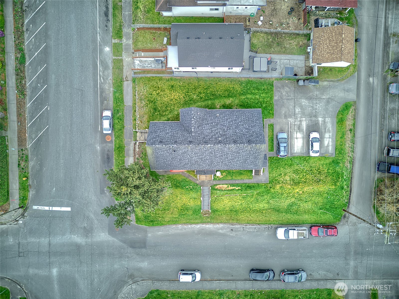 1018 Wall Street Everett, WA 98201 - Photo 19 of 20 front view of a brick house with a yard