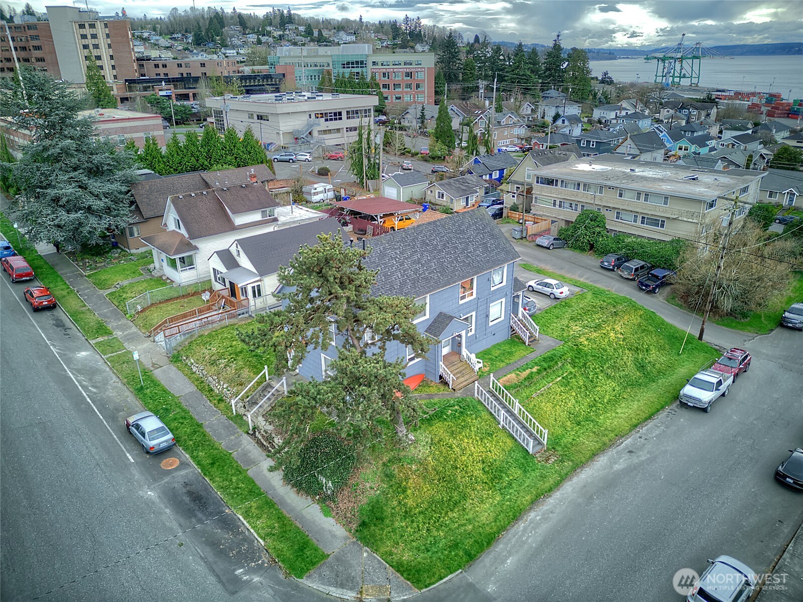 1018 Wall Street Everett, WA 98201 - Photo 20 of 20 an aerial view of a house with a garden and lake view