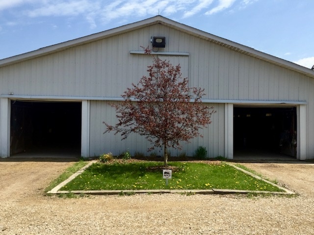 41955 North Mill Creek Road Wadsworth, IL 60083 - Photo 5 of 9 a front view of a house with garden
