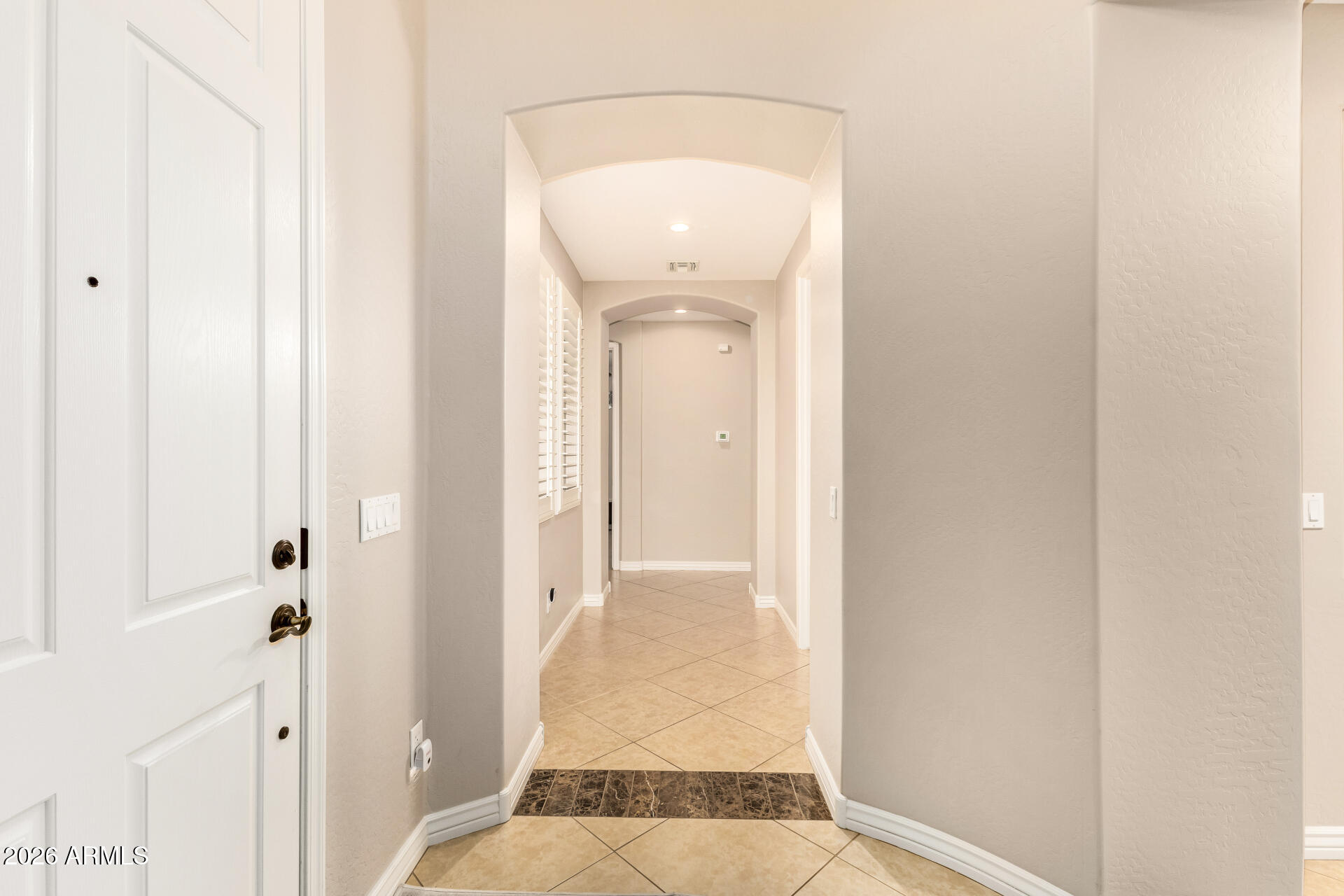 15313 West Roma Avenue Goodyear, AZ 85395 - Photo 23 of 37 Hallway from the front door