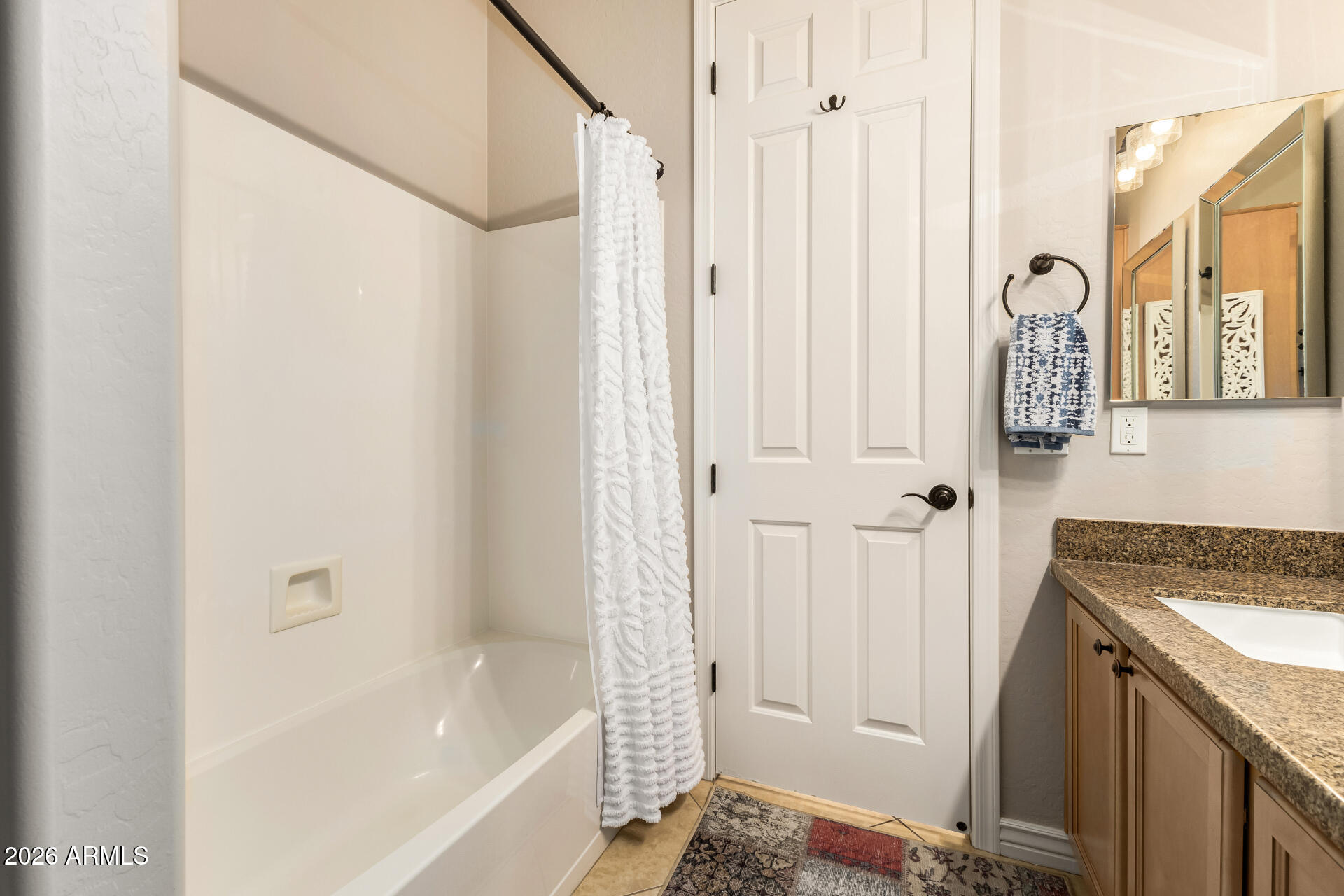 15313 West Roma Avenue Goodyear, AZ 85395 - Photo 31 of 37 Hallway Bathroom