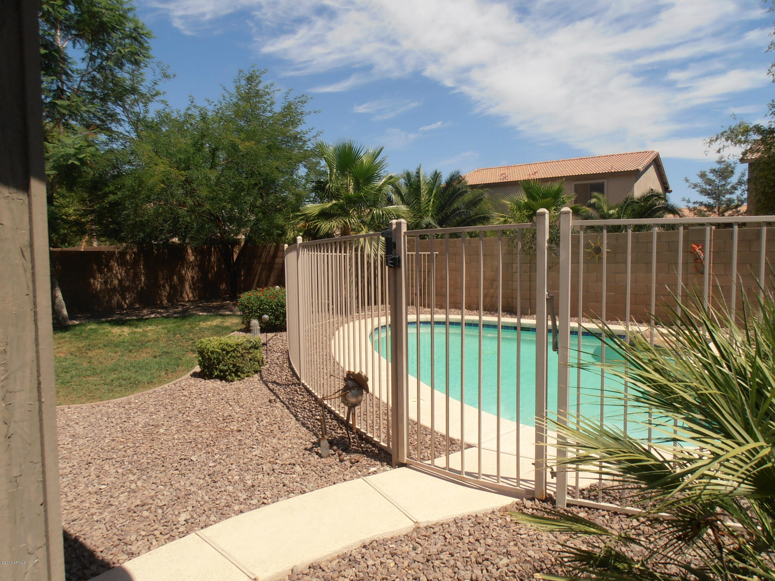 16144 West Calavar Road Surprise, AZ 85379 - Photo 1 of 9 Pool & Backyard