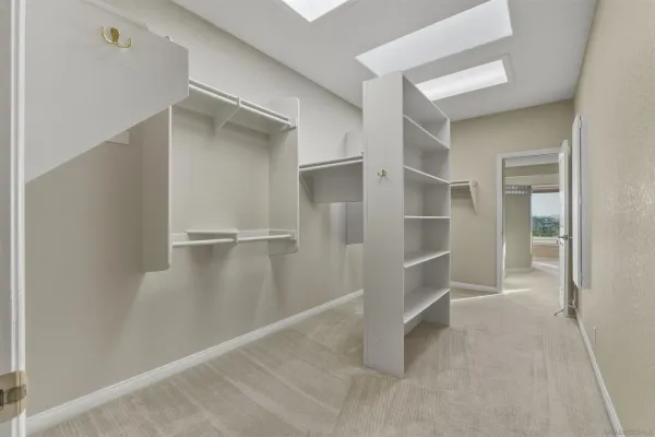 a view of an empty walk in closet