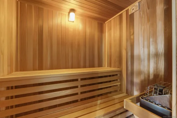a bathroom with a shower curtain and a sink