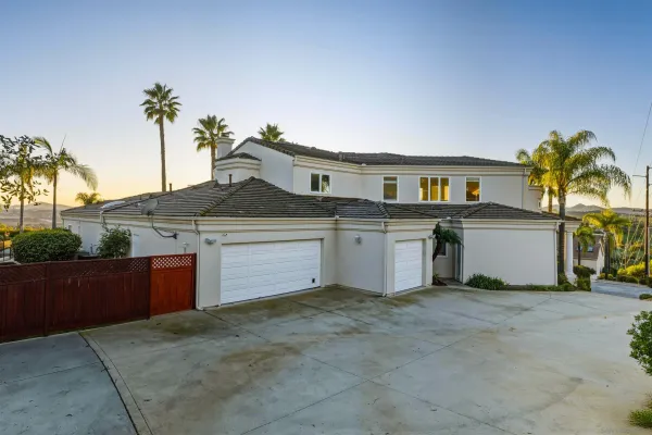 a view of a house with a garden