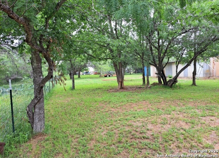 673 Zigmont Road San Antonio, TX 78263 - Photo 11 of 14 a view of white house with a backyard
