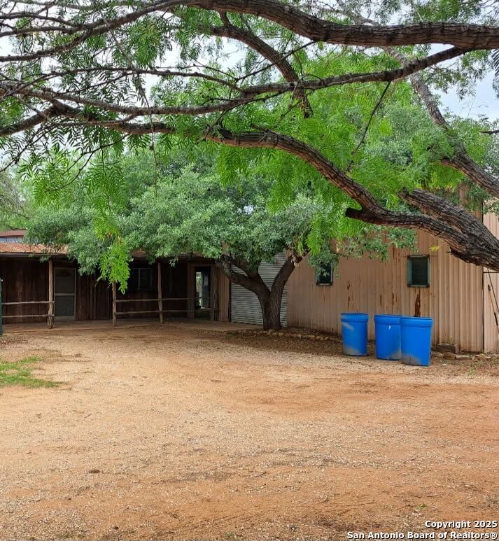 673 Zigmont Road San Antonio, TX 78263 - Photo 4 of 14 a house with a tree in the background