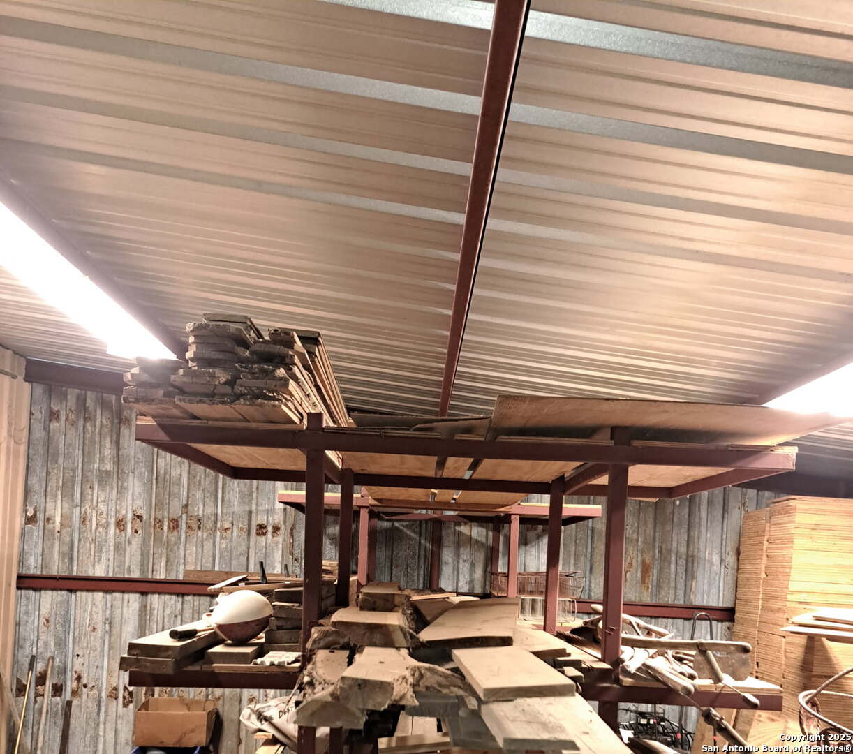 673 Zigmont Road San Antonio, TX 78263 - Photo 7 of 14 a room with lots of wooden furniture