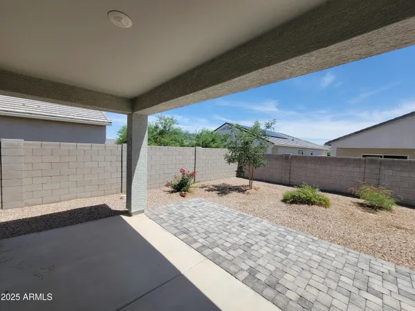 a view of a backyard space