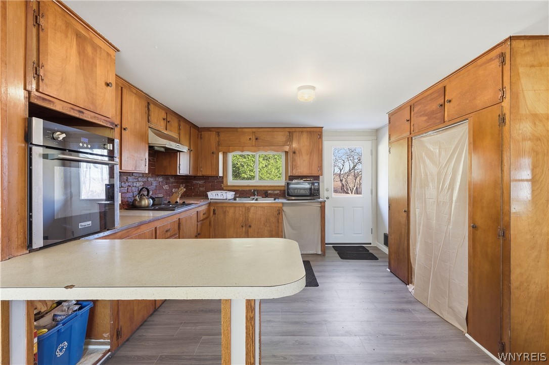 1040 Hughes Road Freedom, NY 14009 - Photo 13 of 29 Kitchen ( large curtain was where the fridge used