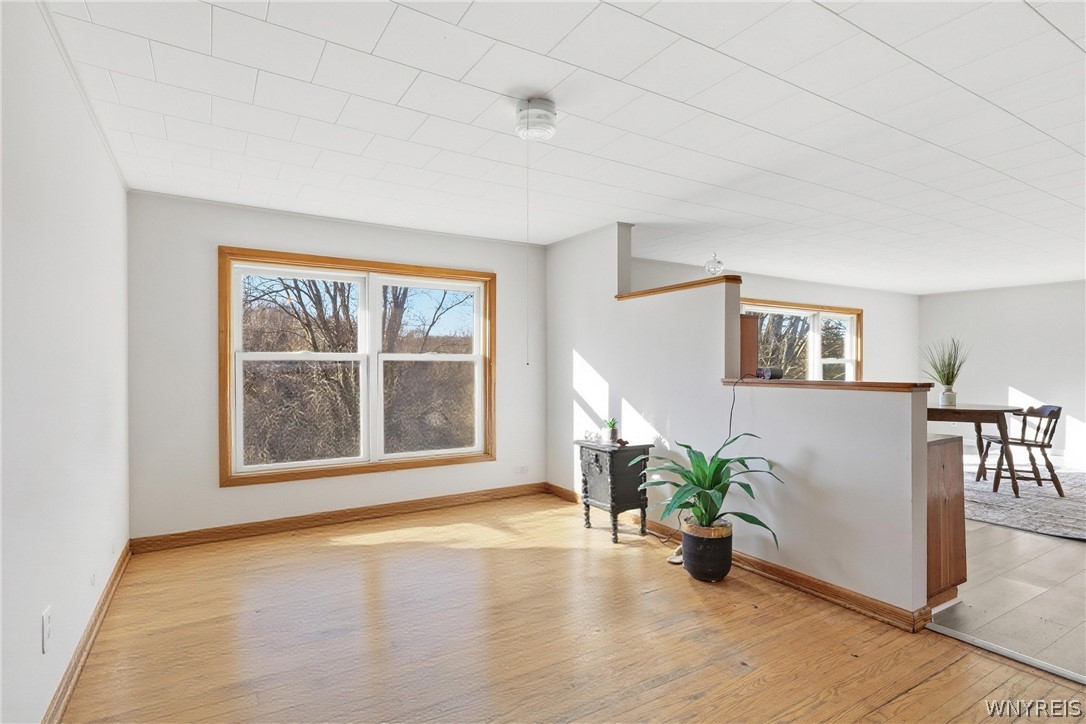 1040 Hughes Road Freedom, NY 14009 - Photo 15 of 29 Dining room area vitually removed the bed