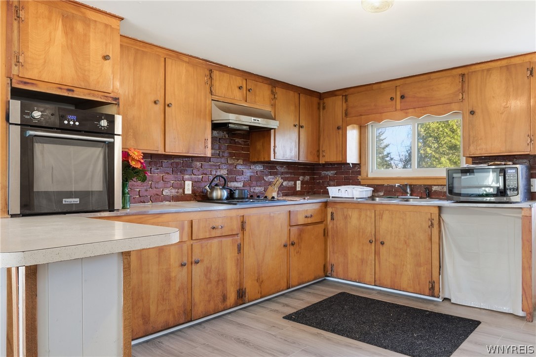 1040 Hughes Road Freedom, NY 14009 - Photo 10 of 29 kitchen has a spot for a built in Dishwasher, hook