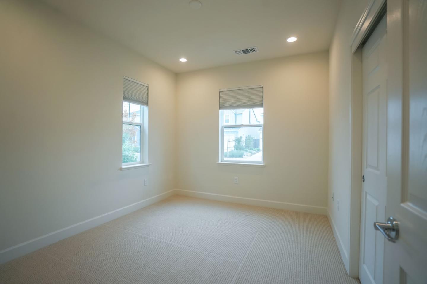 4124 Maddy Avenue Tracy, CA 95377 - Photo 17 of 55 an empty room with windows
