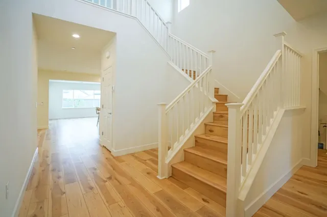 a view of a hallway with staircase