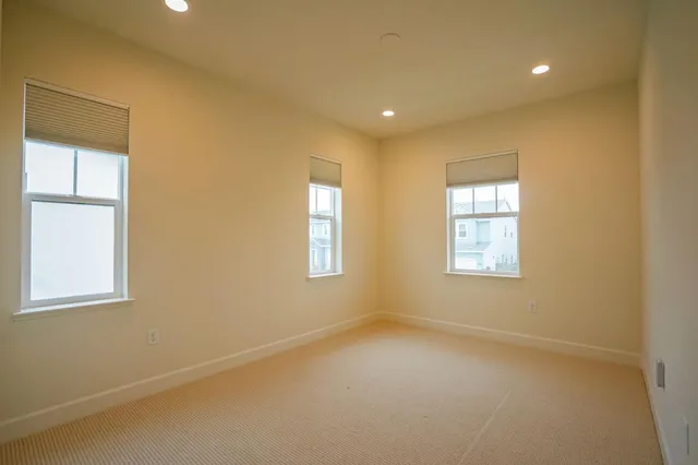 a bathroom with a bathtub and a toilet