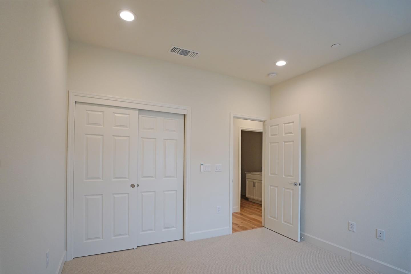 4124 Maddy Avenue Tracy, CA 95377 - Photo 46 of 55 an empty room with closet and a bathroom