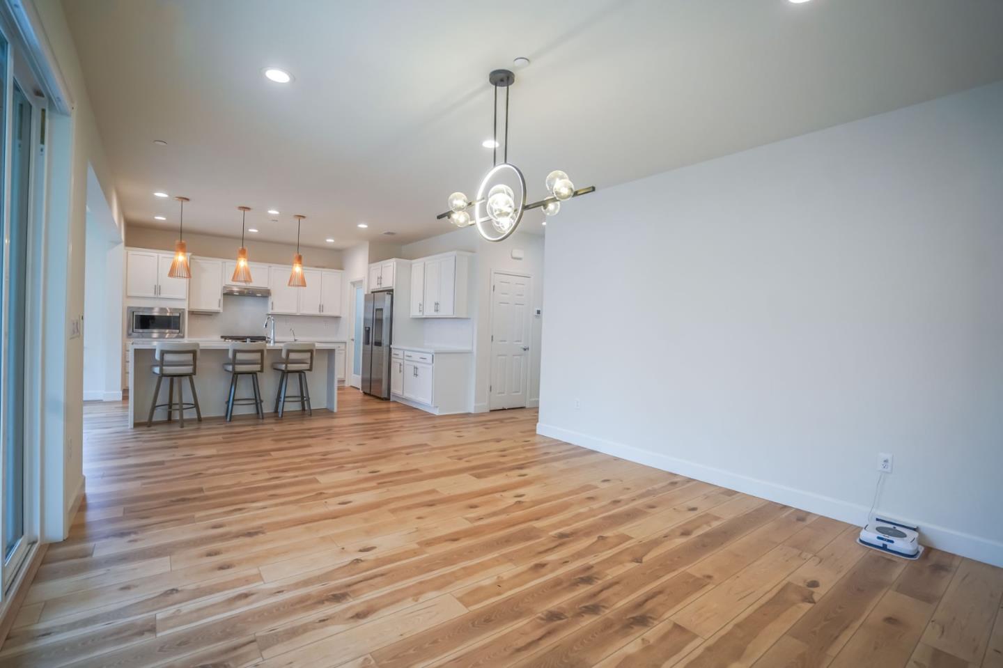4124 Maddy Avenue Tracy, CA 95377 - Photo 5 of 55 a view of a kitchen with a table and chairs