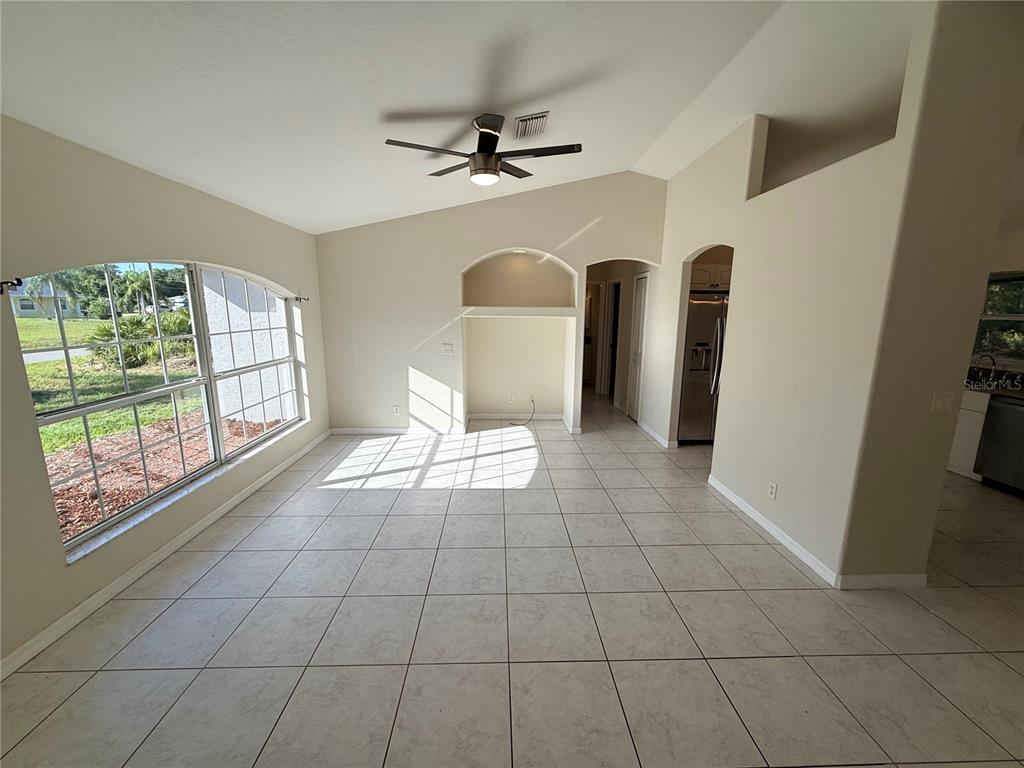 4185 Amari Road North Port, FL 34291 - Photo 3 of 14 a view of an empty room with a window