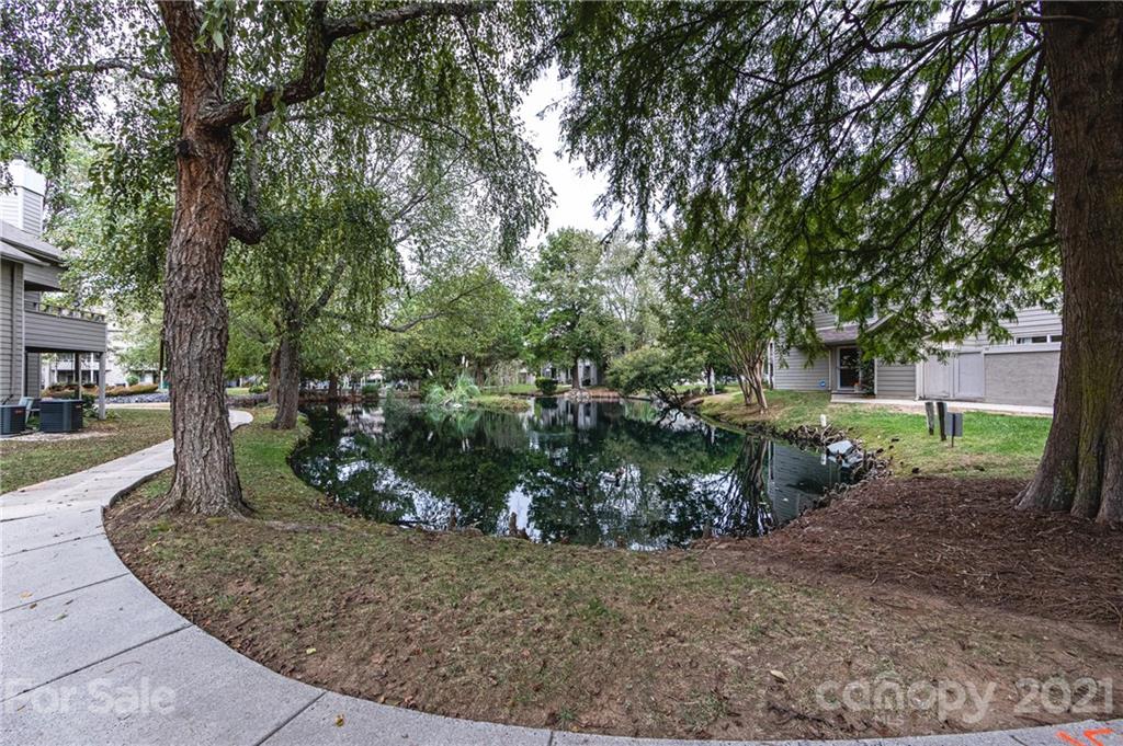 2539 Stockbridge Drive, Unit A Charlotte, NC 28210 - Photo 17 of 21 a view of a house with a street