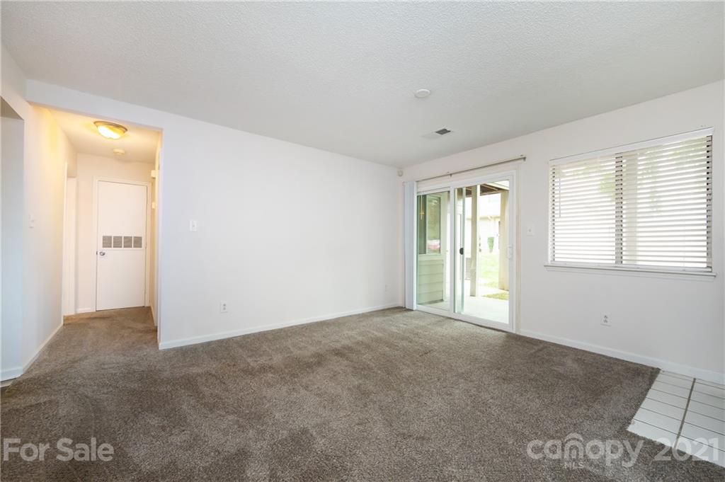 2539 Stockbridge Drive, Unit A Charlotte, NC 28210 - Photo 6 of 21 a view of an empty room with a window