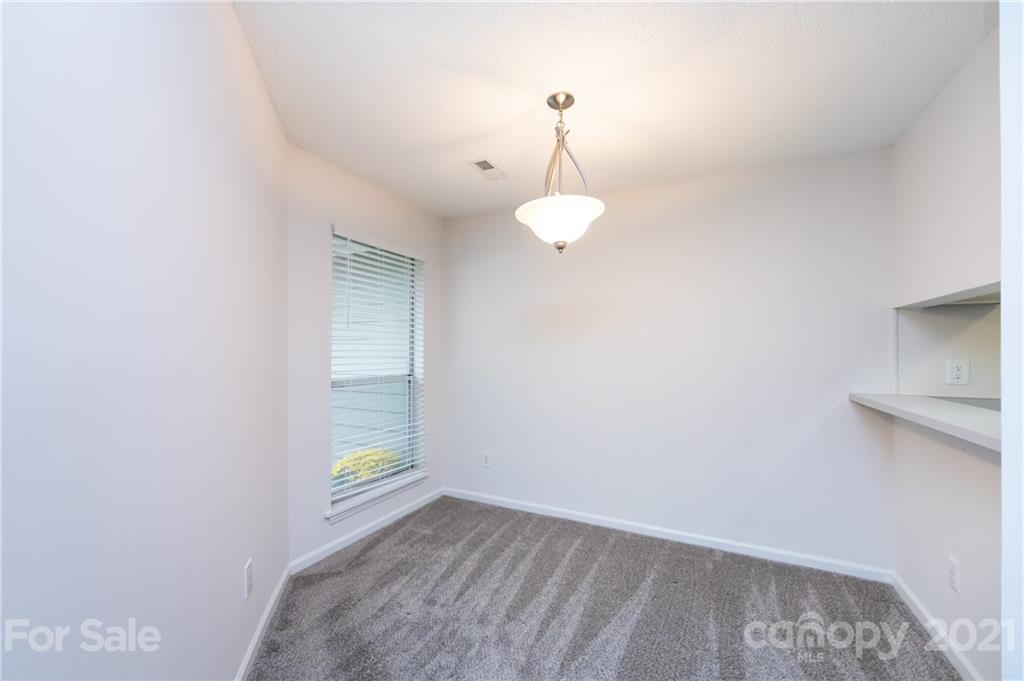 2539 Stockbridge Drive, Unit A Charlotte, NC 28210 - Photo 9 of 21 a view of an empty room with a window