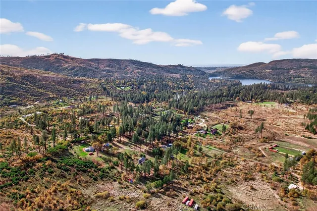 a view of a building with a mountain