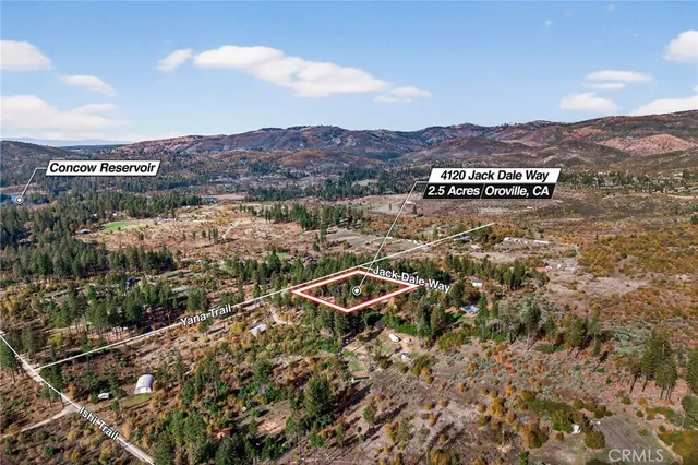an aerial view of residential house and green space