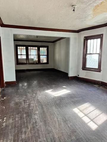 an empty room with windows