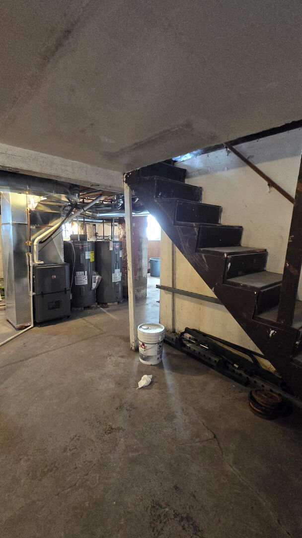 11944 South Perry Avenue Chicago, IL 60628 - Photo 6 of 8 a view of an empty room