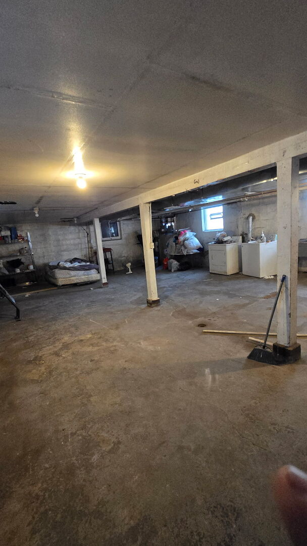 11944 South Perry Avenue Chicago, IL 60628 - Photo 8 of 8 a view of a car garage