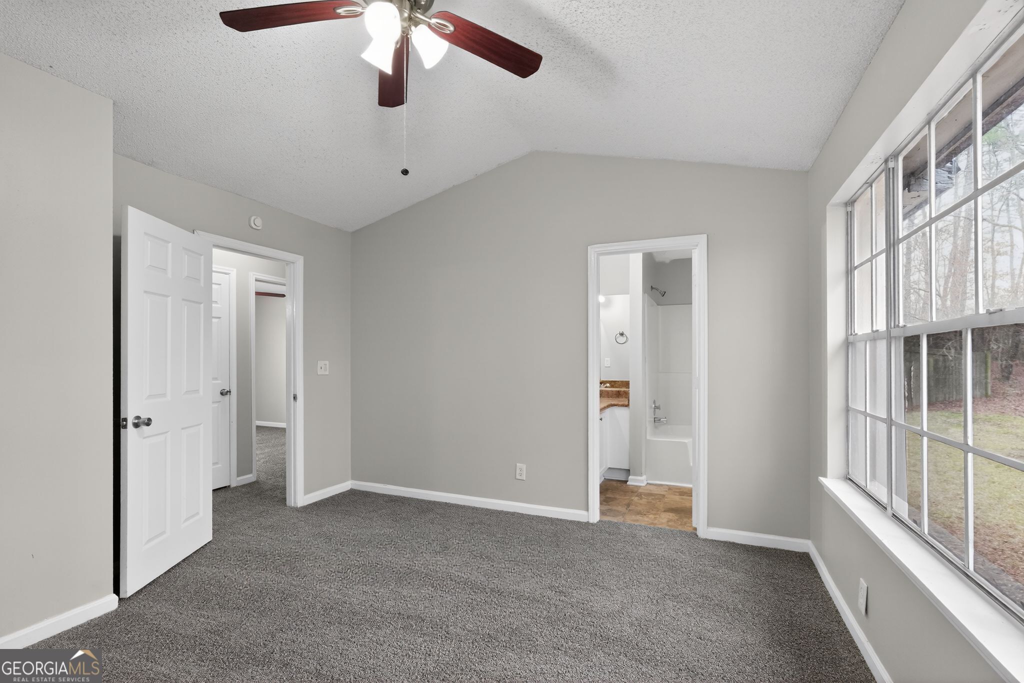 3263 River Mist Cove Decatur, GA 30034 - Photo 30 of 38 wooden floor in an empty room with a window