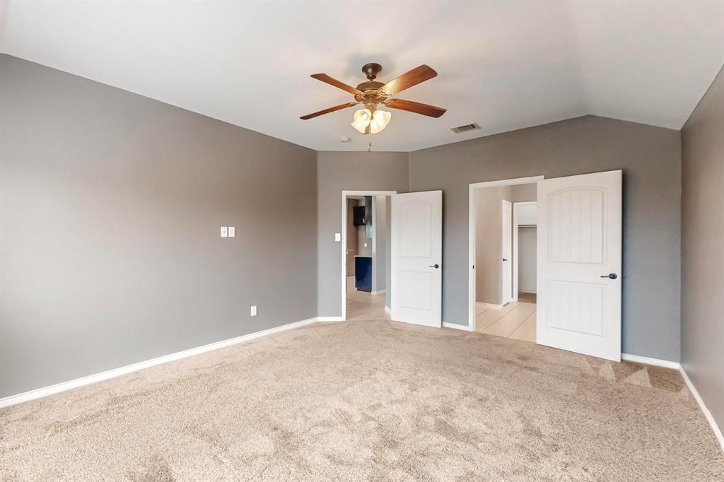 970 Austin Lane Lavon, TX 75166 - Photo 7 of 26 a view of an empty room with a ceiling fan