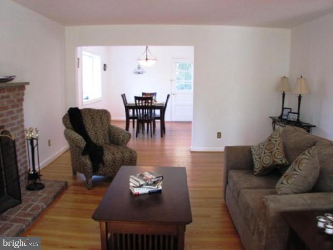 3713 North Glebe Road Arlington, VA 22207 - Photo 11 of 30 a living room with furniture and wooden floor