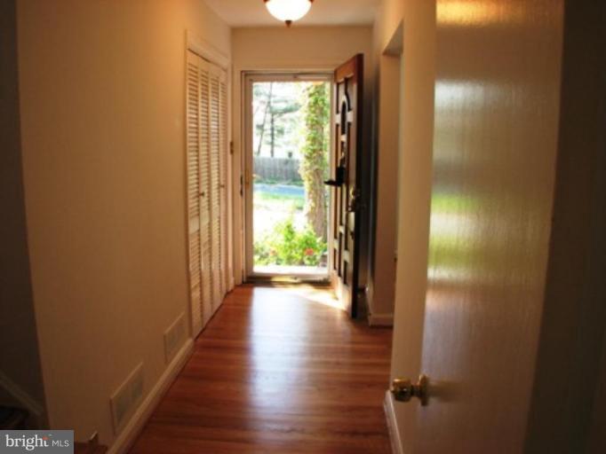 3713 North Glebe Road Arlington, VA 22207 - Photo 18 of 30 a view of hallway with wooden floor