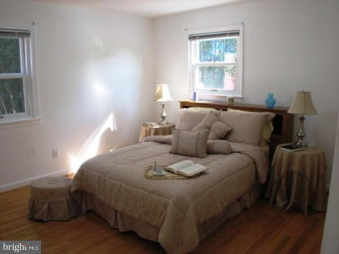 3713 North Glebe Road Arlington, VA 22207 - Photo 19 of 30 a bedroom with a bed and window