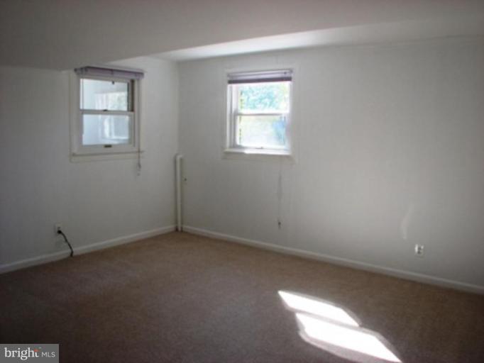 3713 North Glebe Road Arlington, VA 22207 - Photo 25 of 30 an empty room with a window
