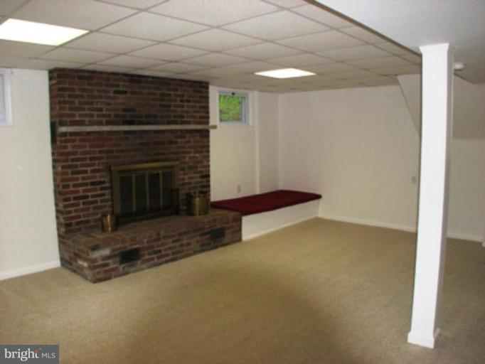 3713 North Glebe Road Arlington, VA 22207 - Photo 26 of 30 a view of empty room with fireplace
