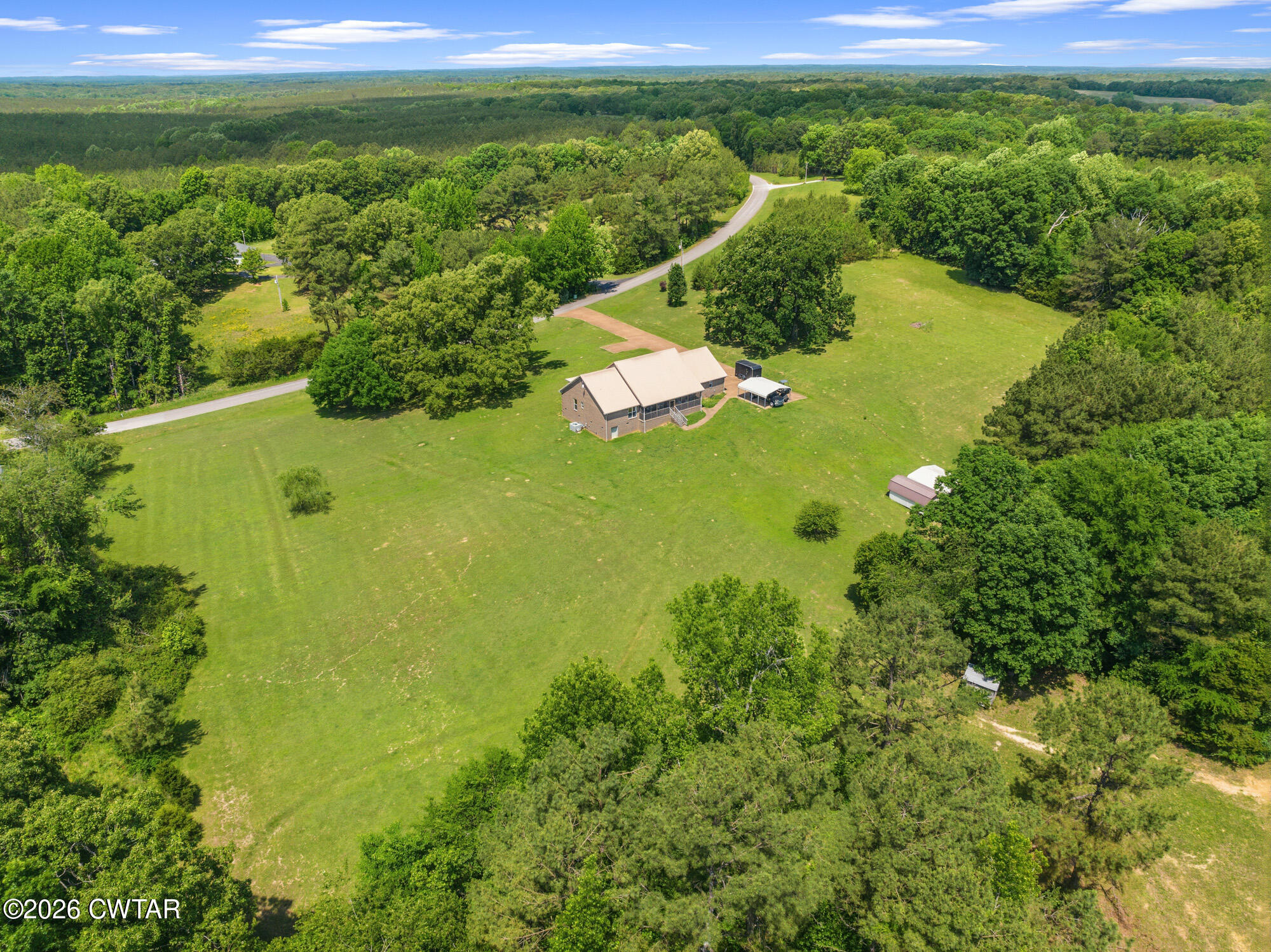 492 Joe Horton Road Lexington, TN 38351 - Photo 45 of 49 a view of a lake with a yard