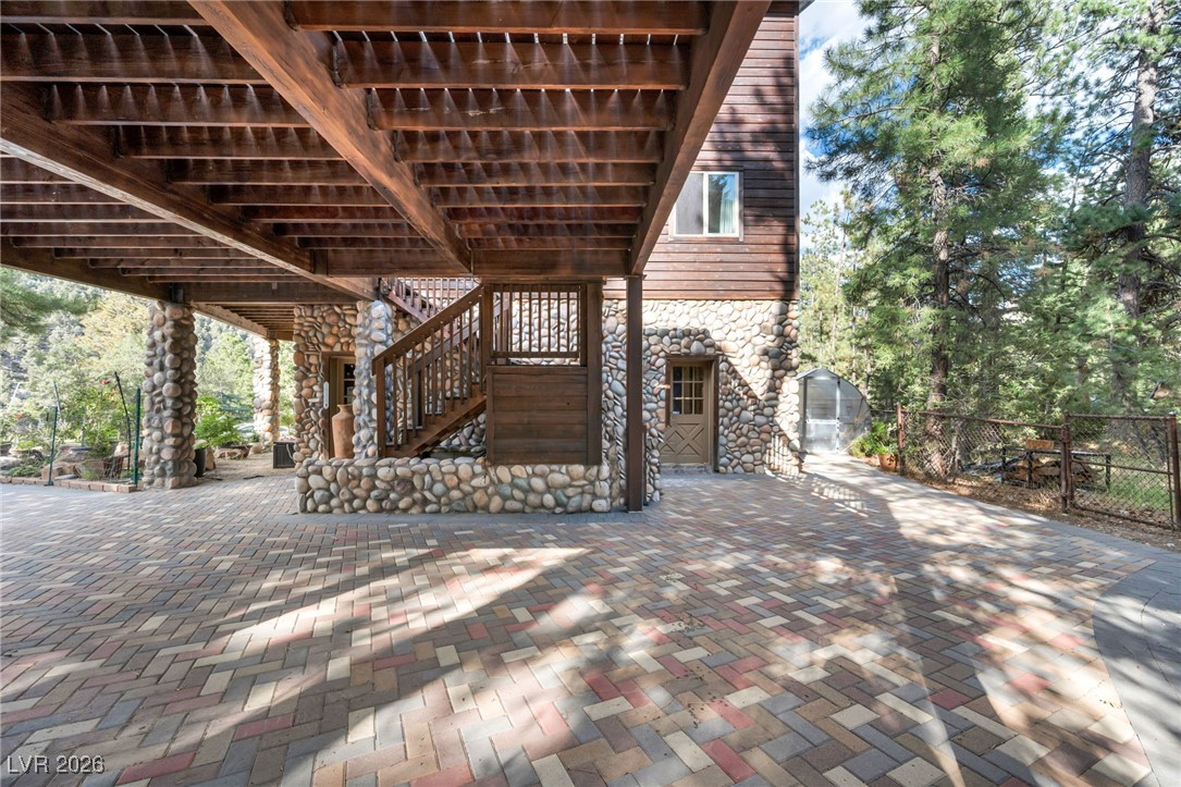 4137 Matterhorn Way Las Vegas, NV 89124 - Photo 14 of 75 View of patio / terrace with stairs and a wooden deck