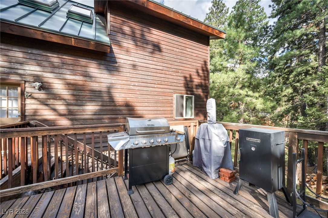 4137 Matterhorn Way Las Vegas, NV 89124 - Photo 26 of 75 Wooden deck with a grill