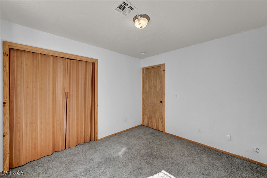 4137 Matterhorn Way Las Vegas, NV 89124 - Photo 44 of 75 Unfurnished bedroom with carpet floors and a closet