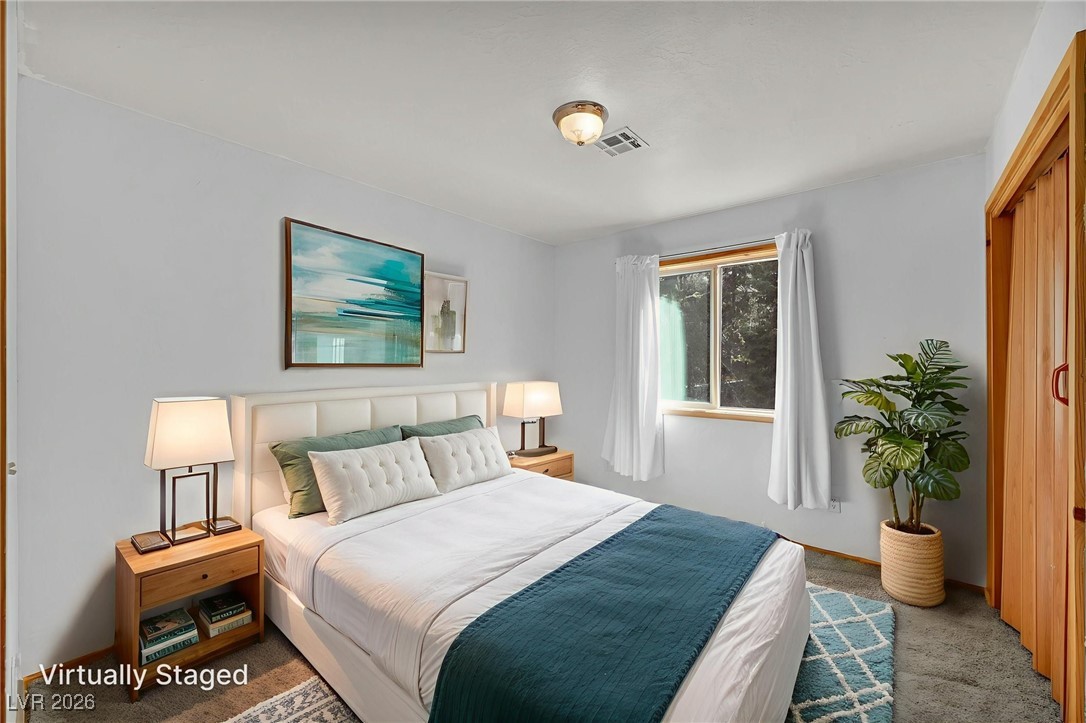 4137 Matterhorn Way Las Vegas, NV 89124 - Photo 45 of 75 Bedroom with carpet flooring