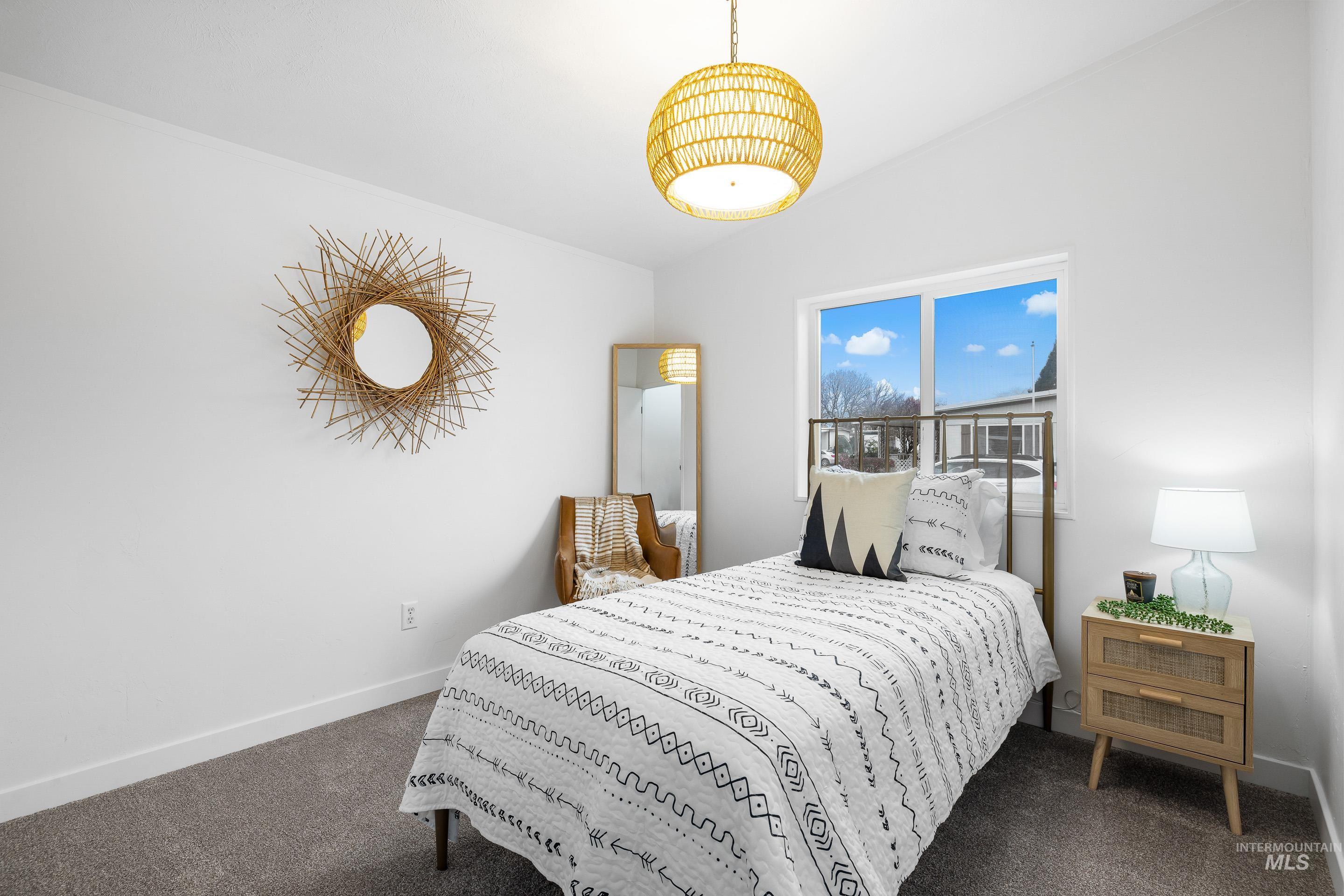 10014 Dewitt Lane Boise, ID 83704 - Photo 36 of 50 Bedroom featuring baseboards and dark carpet