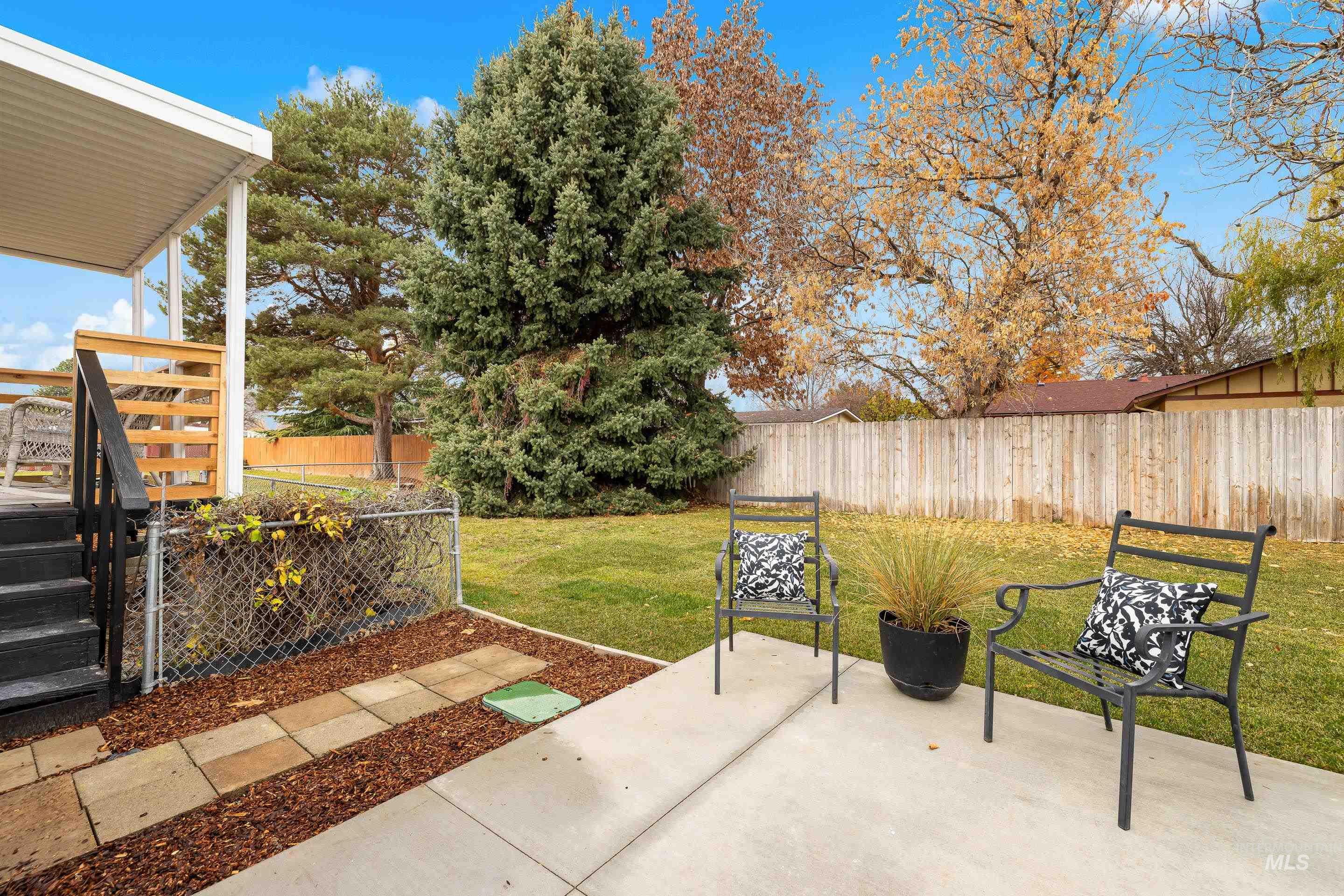 10014 Dewitt Lane Boise, ID 83704 - Photo 49 of 50 Fenced backyard with a patio area