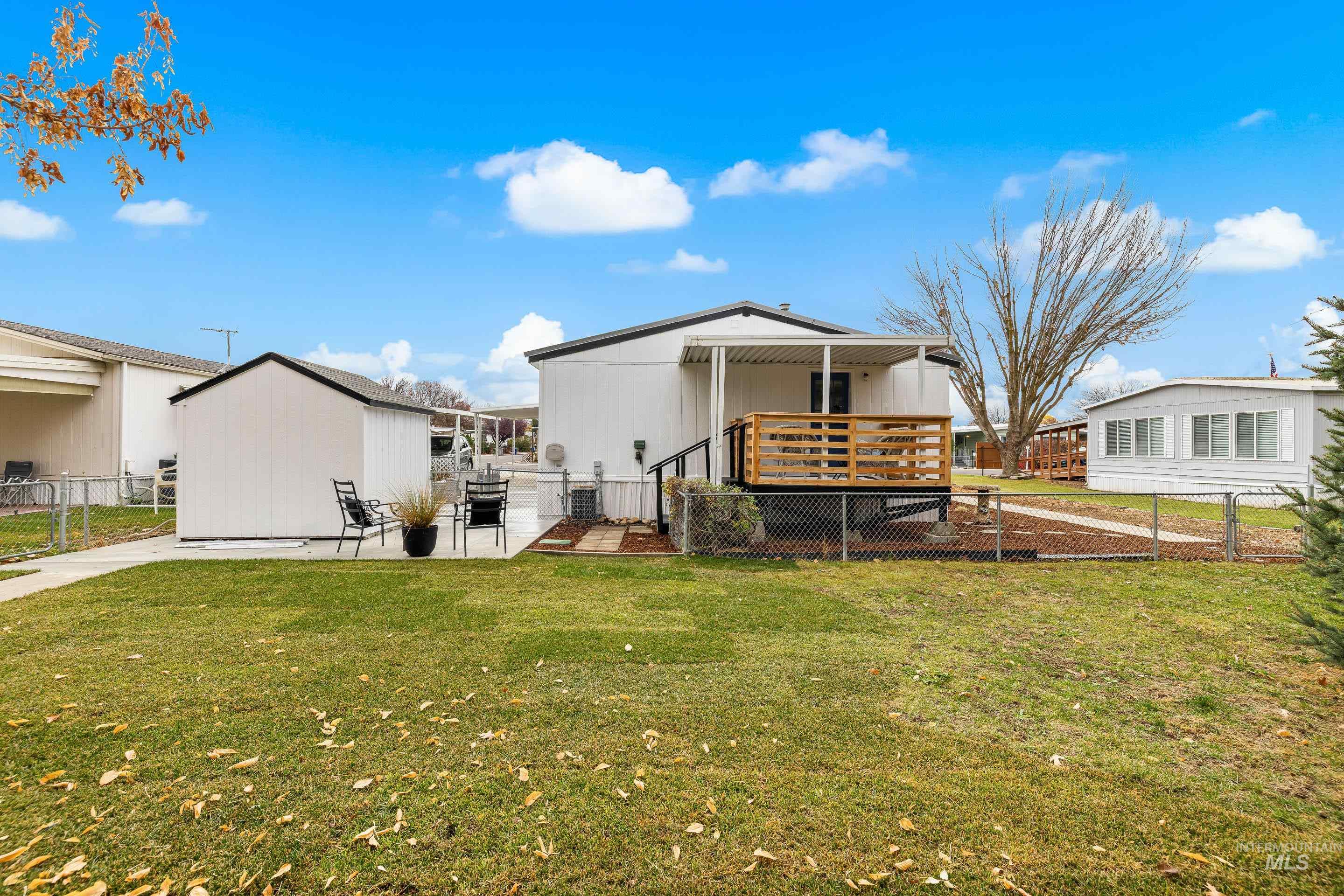 10014 Dewitt Lane Boise, ID 83704 - Photo 50 of 50 Back of house featuring a patio and a deck