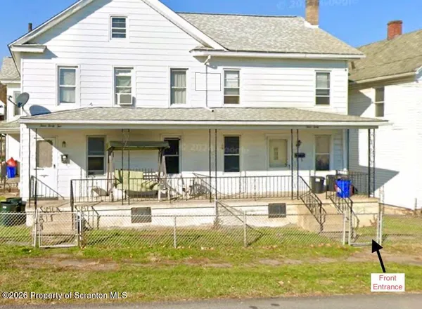 a house view with a outdoor space