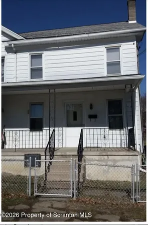 a view of a house with a balcony