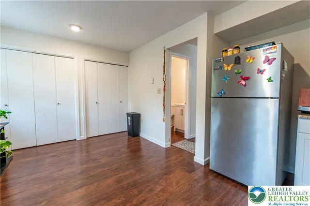 a white refrigerator freezer sitting in a kitchen