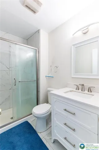 a view of a livingroom and a mirror